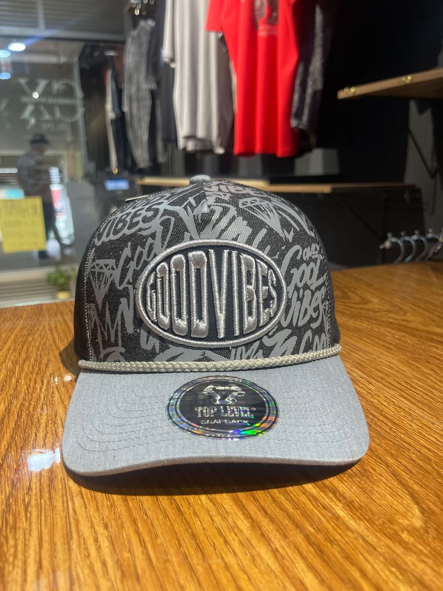 Gorra Quiksilver gris estampado tipográfico visera gris