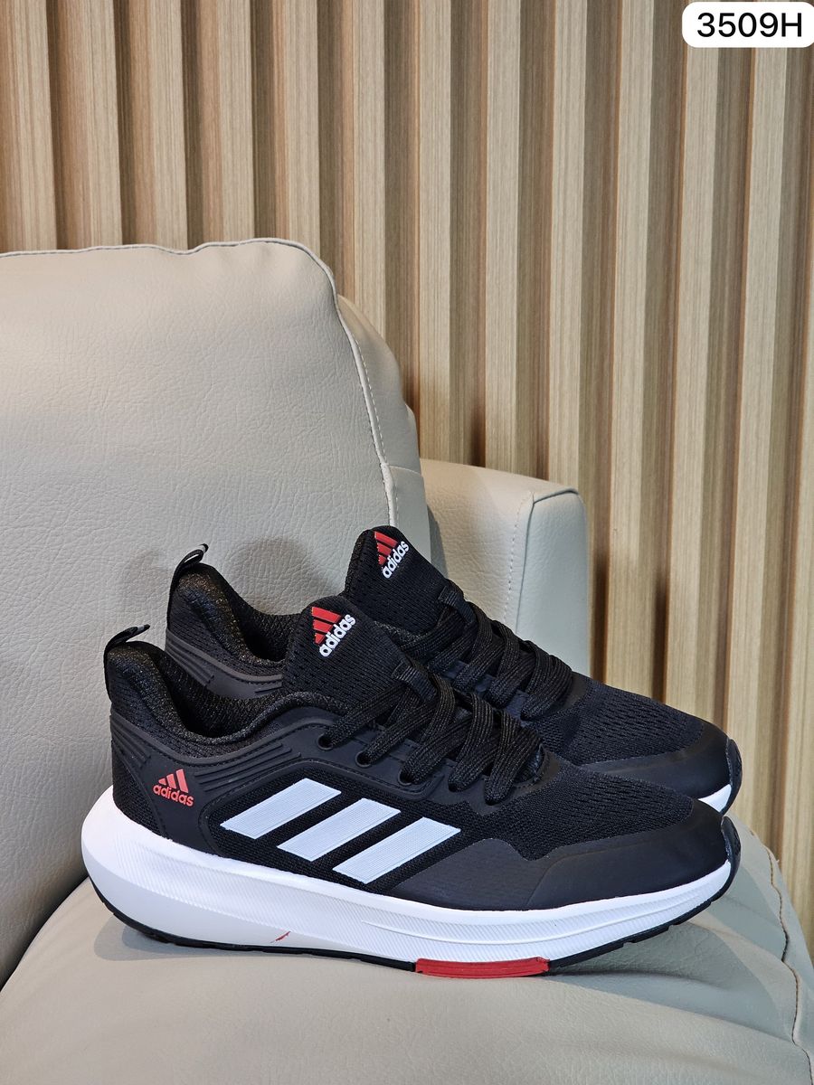 Zapatillas running negras franjas blancas rojas